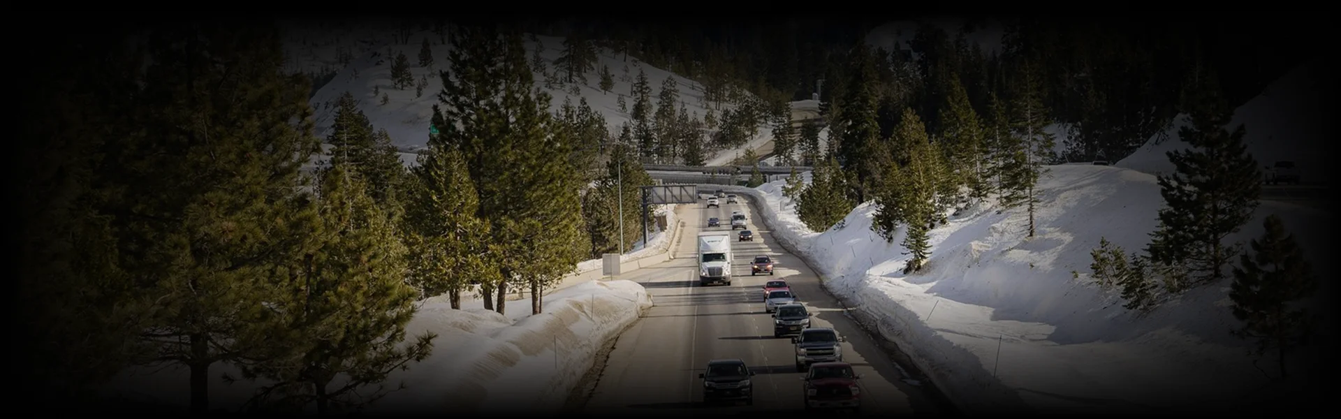 Snow-covered alpine town nestled in the mountains, showcasing the breathtaking scenery along the Denver to Vail route—where every ride feels like part of the destination.